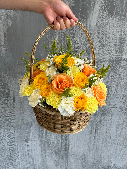 Sunny Elegance: Yellow Roses in a Basket