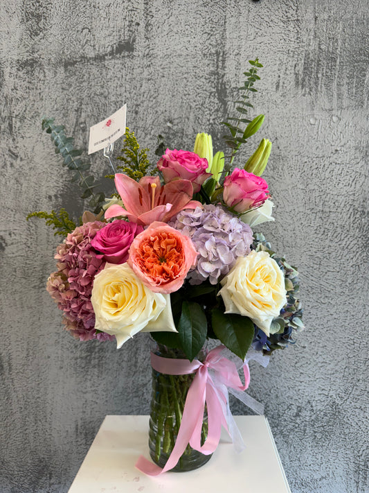 Vase of Vibrance: Handpicked Flowers in a Chic Vase